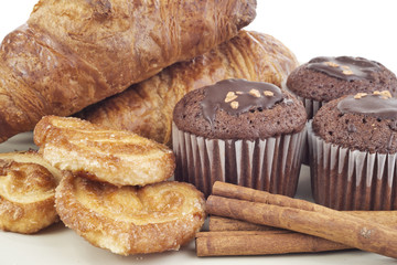 Croissants, muffins, cookies and stiks cinnamon