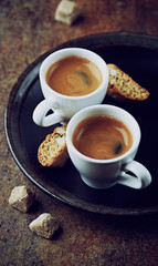Two cups of espresso with cantuccini