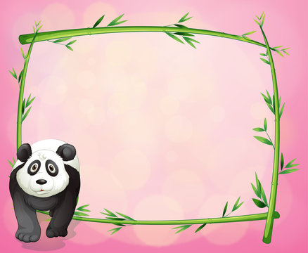 A panda beside a bamboo frame