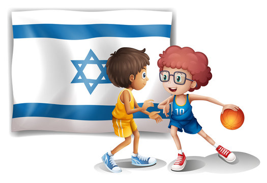 Boys playing basketball in front of the Israel flag