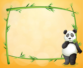 A panda standing at the right side of a bamboo frame