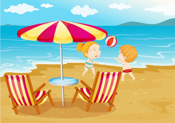 Kids playing volleyball at the beach