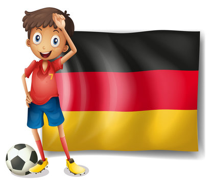 A football player in front of the flag of Germany