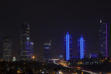 Fototapeta na wymiar City Night View High Rise Buildings