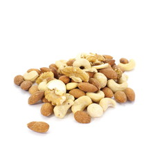 Various mixed nuts isolated on white background