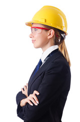 Young businesswoman with hard hat on white