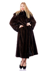 Naklejka premium Tall model wearing fur coat