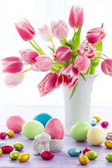 Easter bunny, eggs and tulips