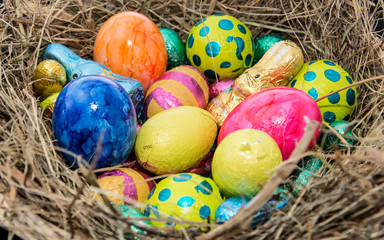 Fototapeta na wymiar Easter Nest with Chocolate Sweets