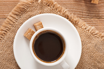 closeup view of a cup of coffee and brown sugar