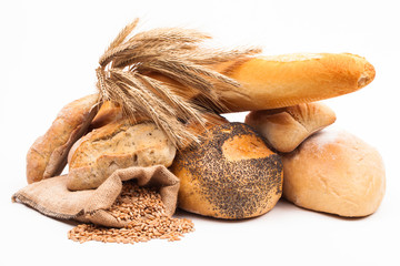 assortment of baked bread isolated on white background