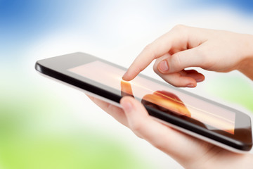 Tablet in girl hands