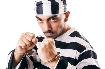 Convict criminal in striped uniform