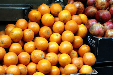 Bunch of  oranges  and Pomegranates  on market