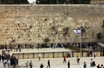 Jewish worshipers  pray at the Wailing Wall
