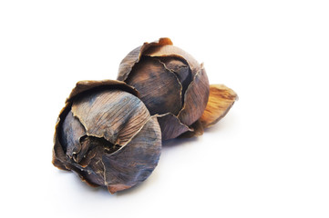 Dry lotus flowers on white background