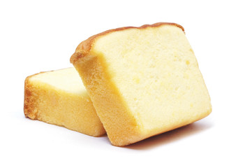 Sliced butter cake on white background