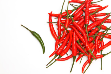 green chili in plie of red chili