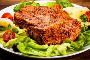 Raw, marinated pork and vegetables