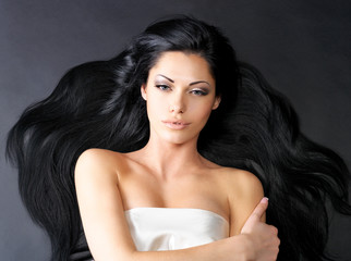Beautiful  woman with long straight hair