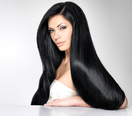 Beautiful  woman with long straight hair