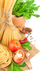 Italian pasta with spices and vegetables, food ingredients