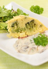 potato dinner with salad and mushroom sauce