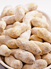 salted peanuts in shell, oval tray