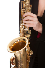 Beautiful young woman playing saxophone
