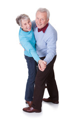 Portrait Of Senior Couple Dancing