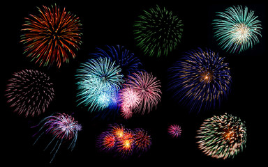 Colorful fireworks of various colors in night sky