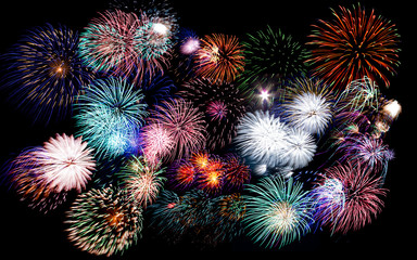 Colorful fireworks of various colors in night sky