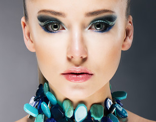 Glamorous Woman in Semi Precious Turquoise Necklace close up