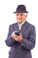 Portrait of an elderly man using mobil phone