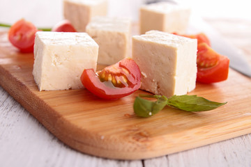 tofu with tomatoes on board