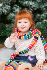 Portrait of a little red-haired girl