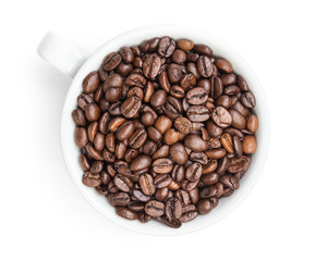 heap of coffee beans in cup