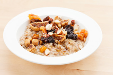 oatmeal with raisins, nuts and maple syrup
