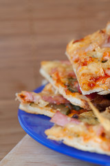 Pizza with meat, cheese on  plate