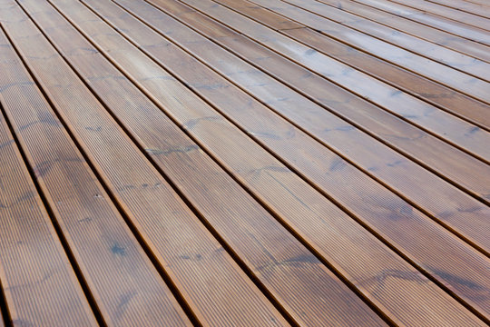 wet terrace brown wood floor