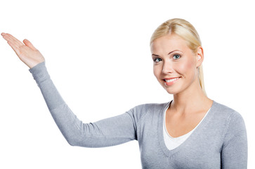 Woman pointing with hand up, isolated on white