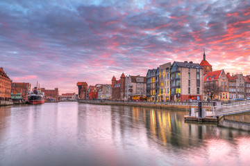 Fototapeta premium Sunset in old town of Gdansk at Motlawa river, Poland
