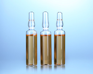medical ampules on blue background