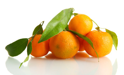 Ripe sweet tangerines with leaves, isolated on white