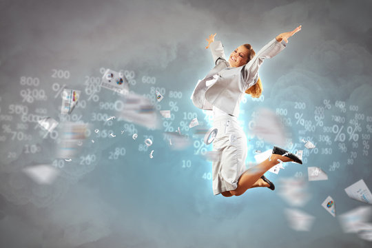 Image of jumping businesswoman