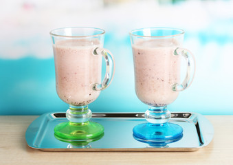 Cream cocktails on brightblue background