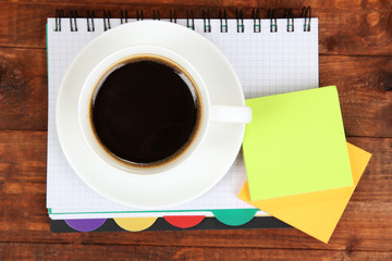 Cup of coffee on worktable close up