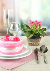 Romantic table serving on bright background