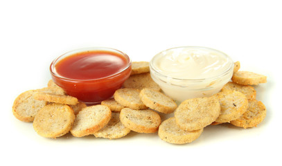 Crackers  and sauces, isolated on white