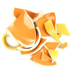 Yellow broken cup isolated on white